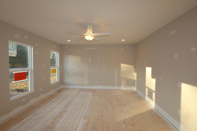 spare room featuring a ceiling fan and recessed lighting