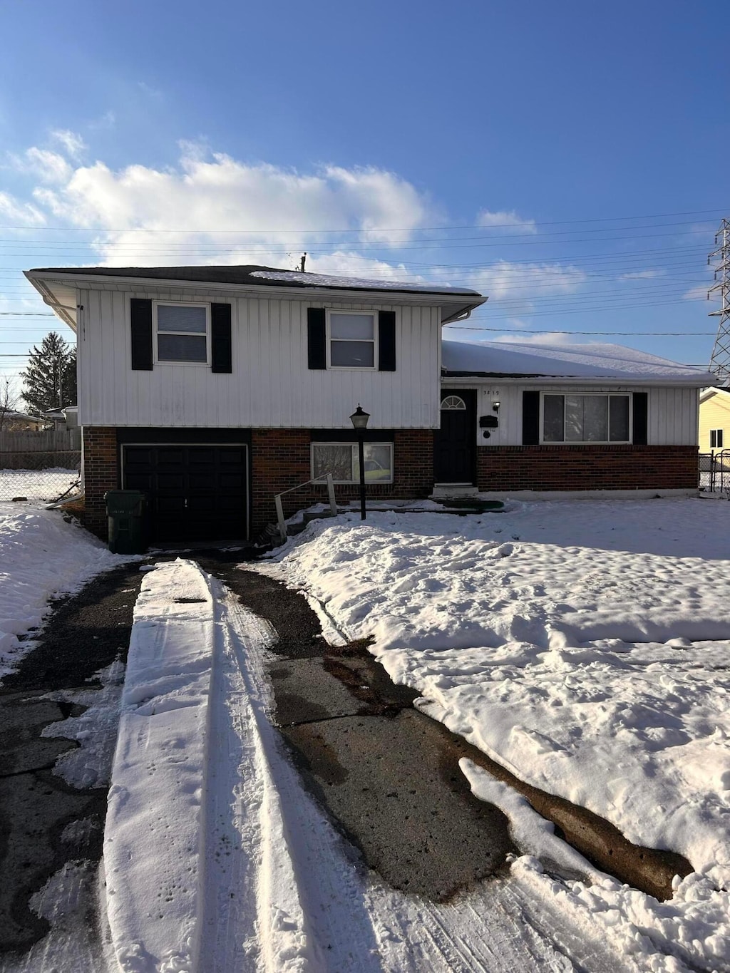 split level home featuring a garage