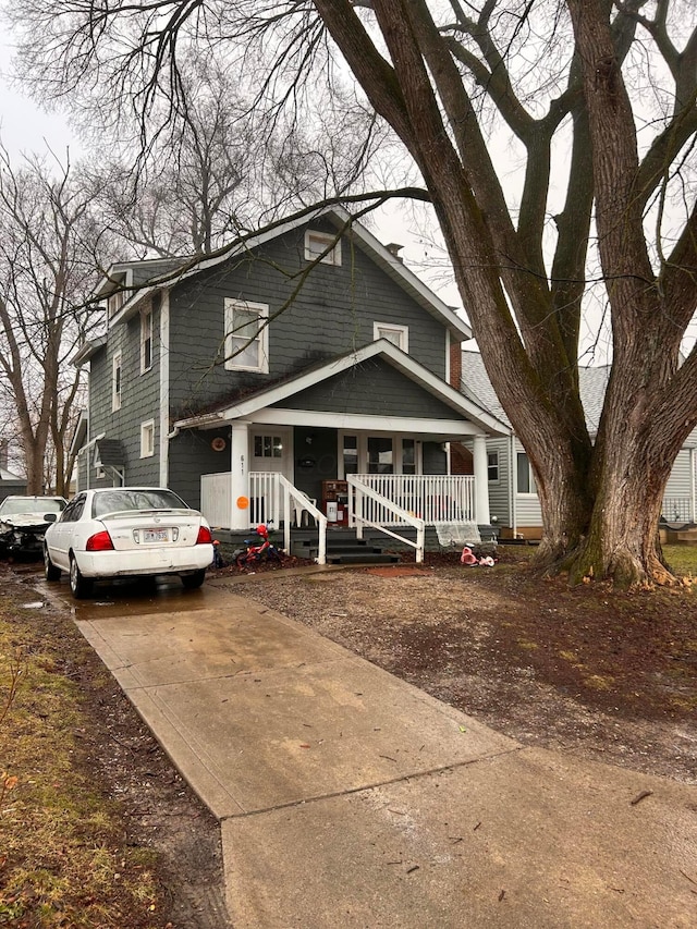 view of front of property featuring covered porch