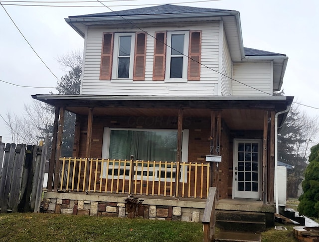 view of front of home featuring covered porch