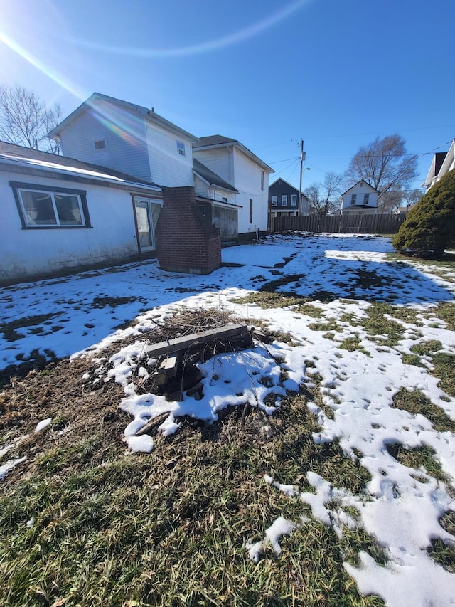 view of snow covered property