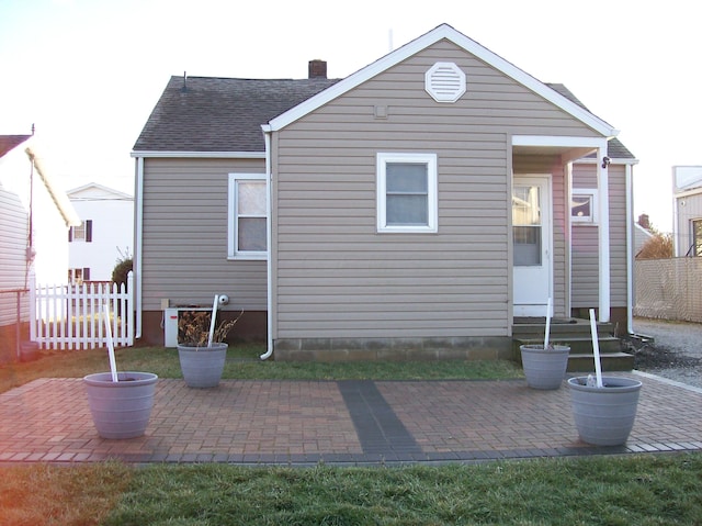 rear view of property with a patio