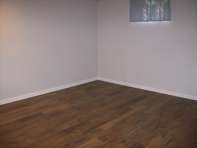 interior space with dark hardwood / wood-style floors