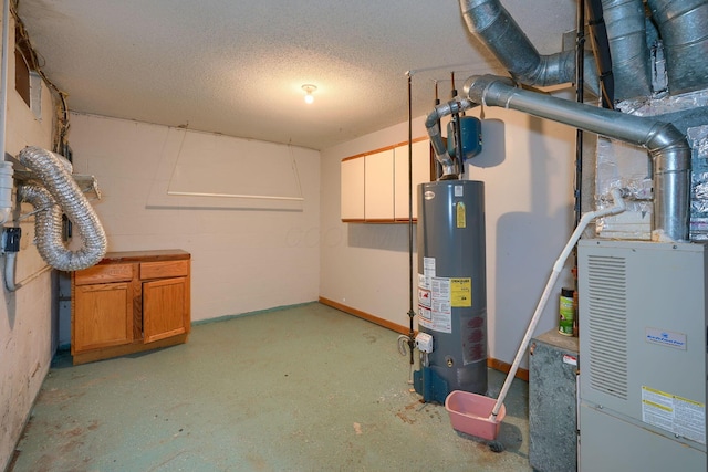 basement with water heater and a textured ceiling