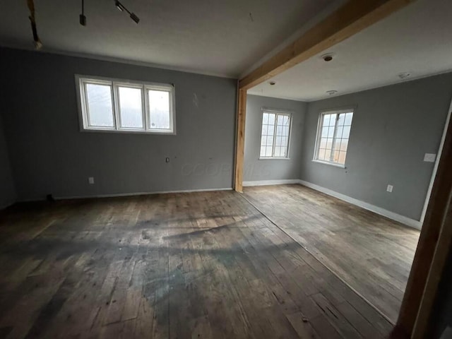 unfurnished room featuring dark hardwood / wood-style floors