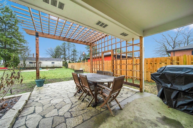 view of patio featuring grilling area and a pergola