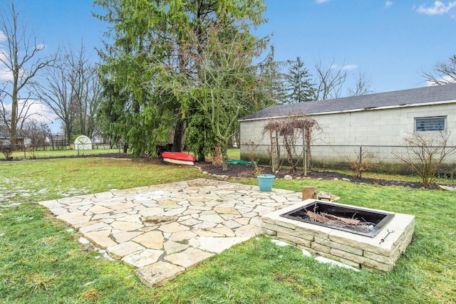 view of patio featuring a fire pit