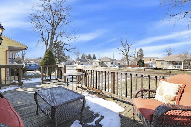 wooden terrace with a residential view