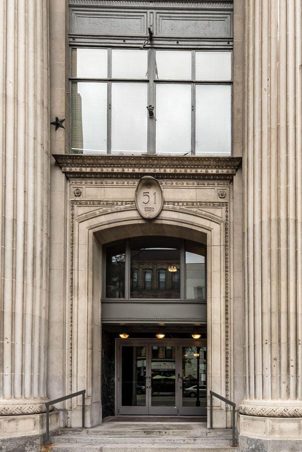 property entrance featuring french doors