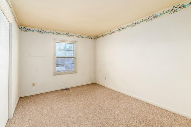 empty room with light carpet