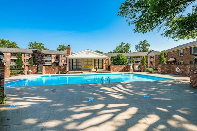 view of pool featuring an outdoor structure