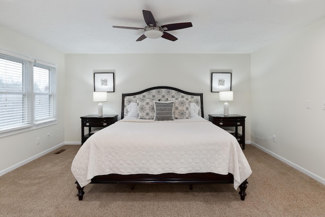 bedroom featuring ceiling fan and carpet flooring