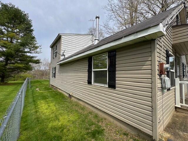 13853 Era Rd, Mount Sterling, OH 43143 - view of side of home featuring a yard and fence