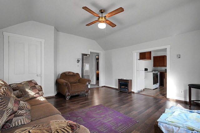 living room featuring vaulted ceiling, dark wood-type flooring, and ceiling fan