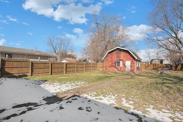 snowy yard featuring an outdoor structure