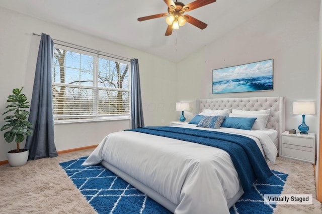 bedroom featuring carpet floors, ceiling fan, and vaulted ceiling