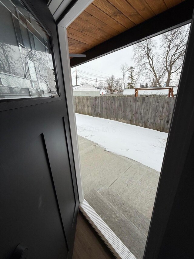 entryway with wood ceiling