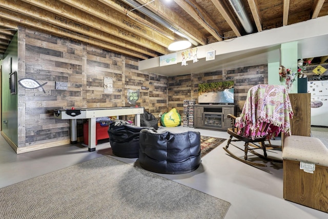 living area featuring concrete flooring