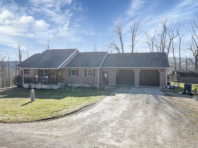 ranch-style house with a garage, dirt driveway, a porch, and a front yard