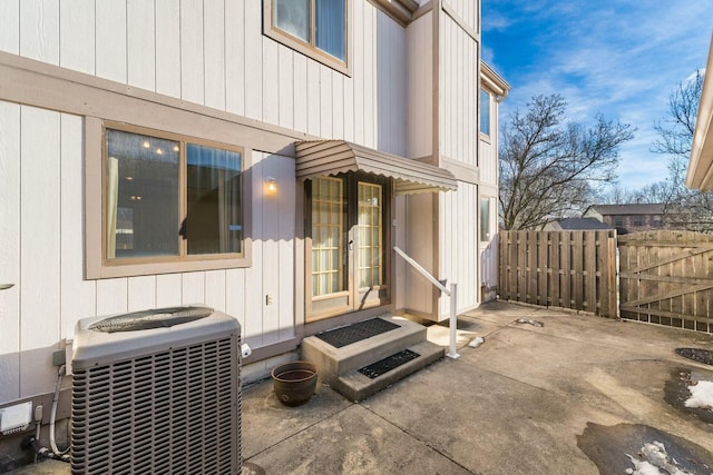 exterior space featuring central AC and french doors