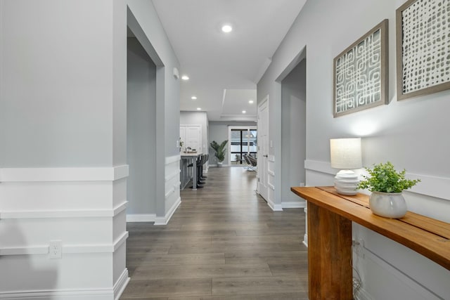 corridor featuring dark hardwood / wood-style floors