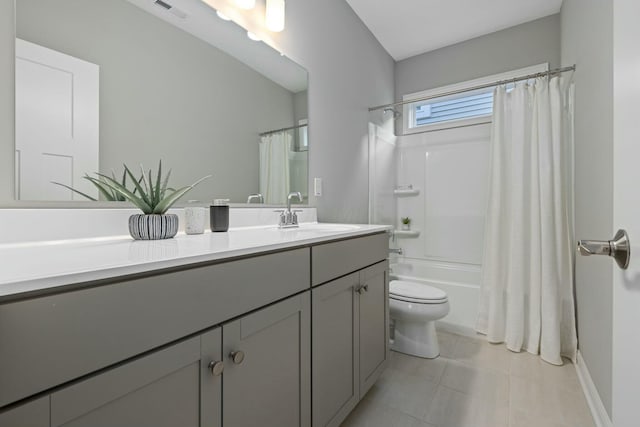 full bathroom with tile patterned flooring, vanity, shower / bathtub combination with curtain, and toilet