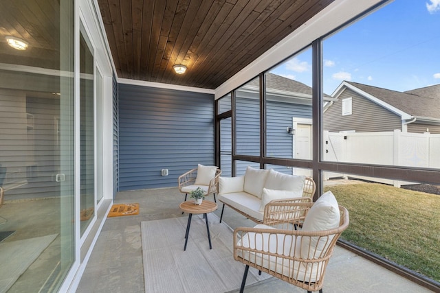 sunroom featuring wood ceiling