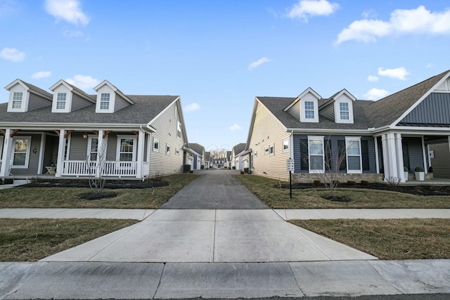 exterior space with a yard and covered porch