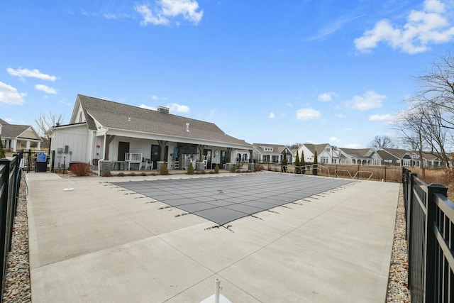 view of pool featuring a patio