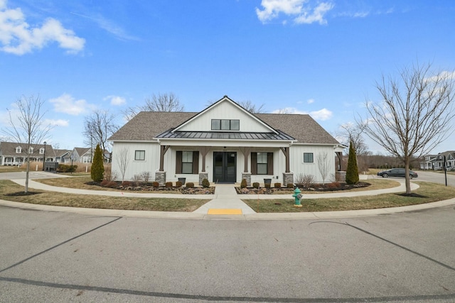 modern farmhouse featuring covered porch