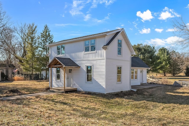 exterior space with a front lawn