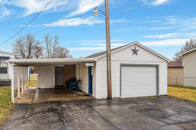 garage with a carport