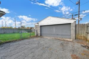 garage featuring a yard