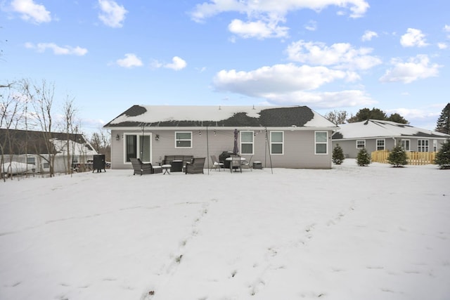 view of snow covered house