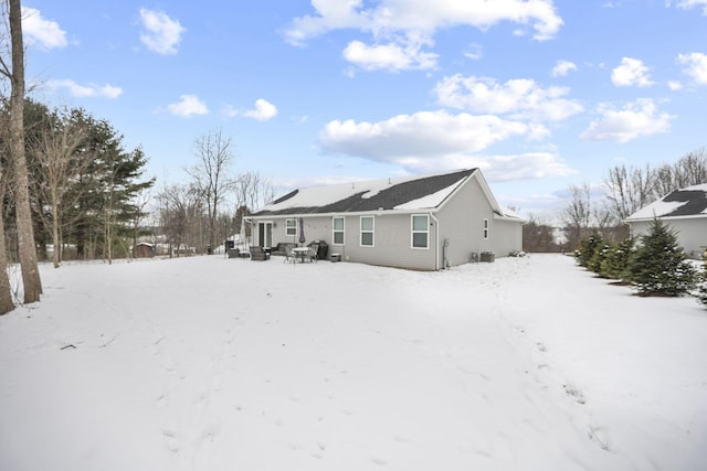 view of snow covered house