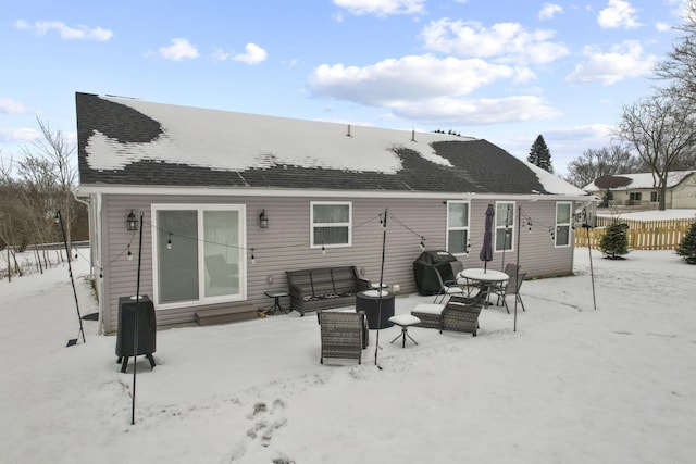 view of snow covered property