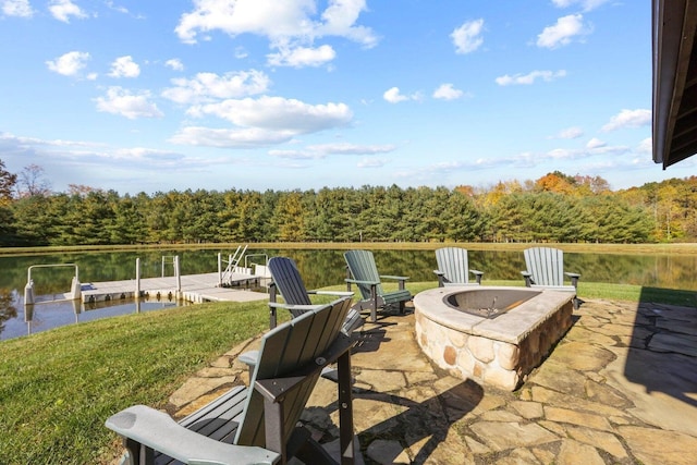 view of patio / terrace with a dock, a water view, and an outdoor fire pit