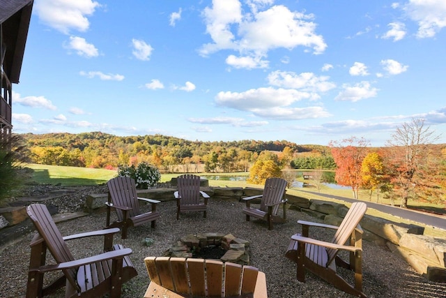 view of patio / terrace with a fire pit