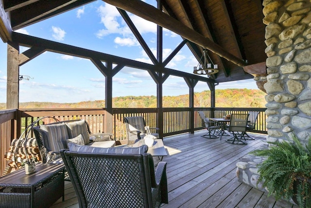 wooden deck with outdoor lounge area