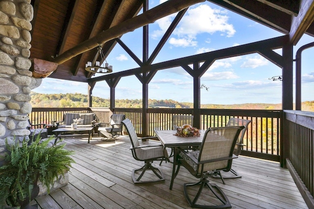 wooden deck with an outdoor living space