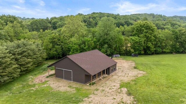 20358 Buena Vista Rd, Rockbridge, OH 43149 - aerial view of property and surrounding area with a heavily wooded area