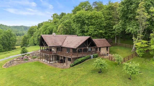 20358 Buena Vista Rd, Rockbridge, OH 43149 - back of house with a deck and a wooded view