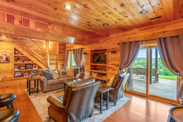 20358 Buena Vista Rd, Rockbridge, OH 43149 - living room with wood walls, wood ceiling, healthy amount of natural light, and hardwood / wood-style flooring