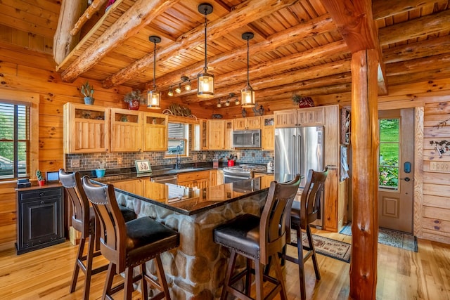 20358 Buena Vista Rd, Rockbridge, OH 43149 - kitchen featuring stainless steel appliances, healthy amount of natural light, light wood-style floors, and wooden ceiling with exposed beams