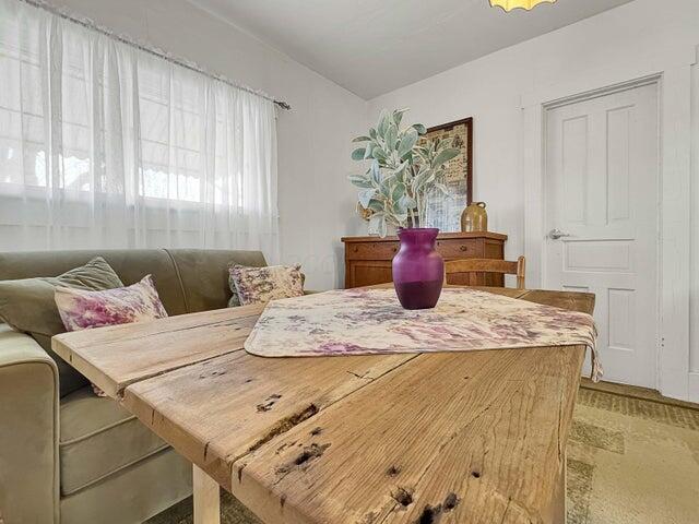 dining area with vaulted ceiling