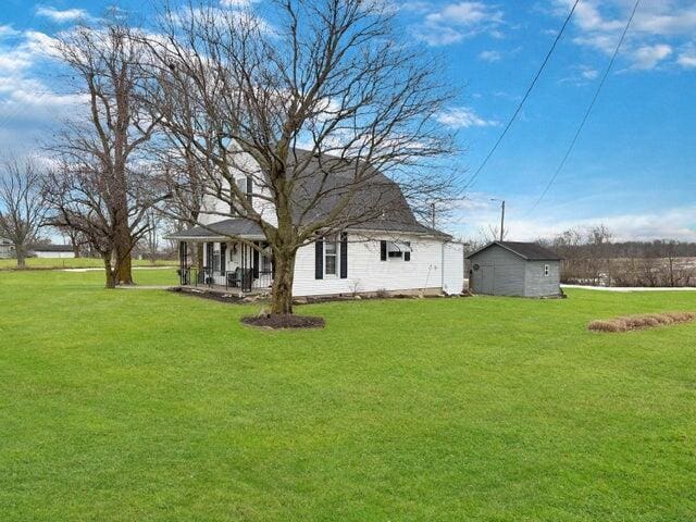 view of yard featuring a porch