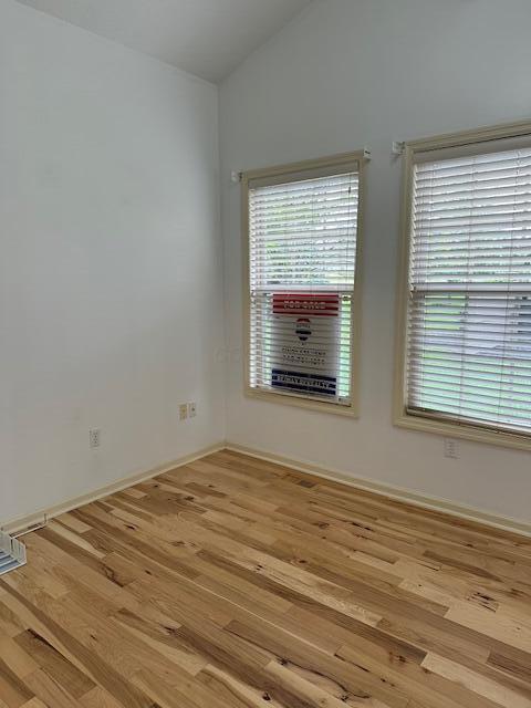 3 Claire Ct, Circleville, OH 43113 - unfurnished room with wood finished floors, vaulted ceiling, and baseboards