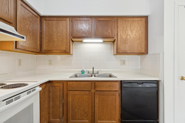 kitchen featuring black dishwasher, sink, and decorative backsplash