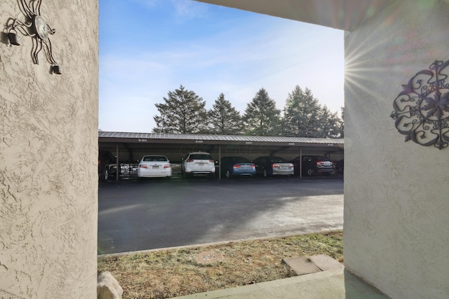 view of car parking with a carport