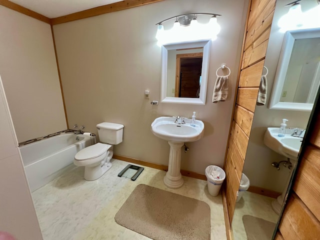 full bathroom with sink, bathtub / shower combination, and toilet